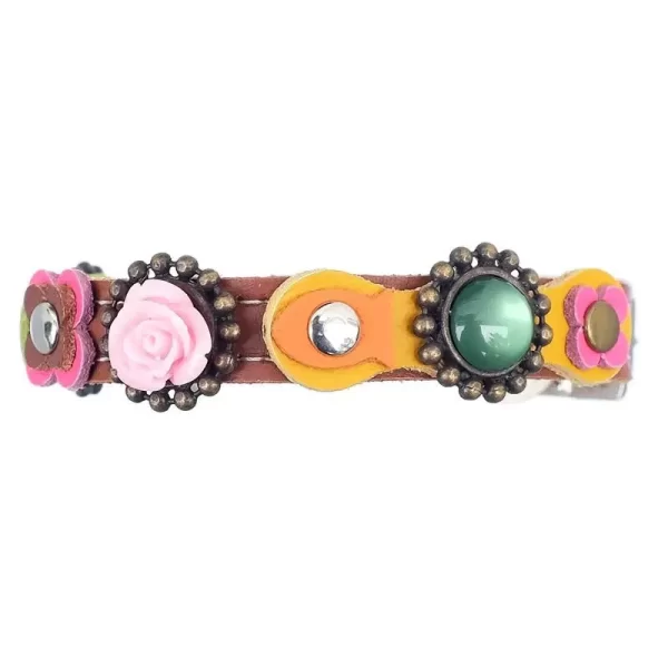 Top side of vintage cat collar pink rose with flowers and stones.