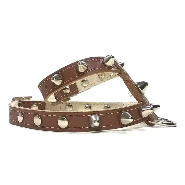 Lateral side of studded punk spiked brown leather dog harness.